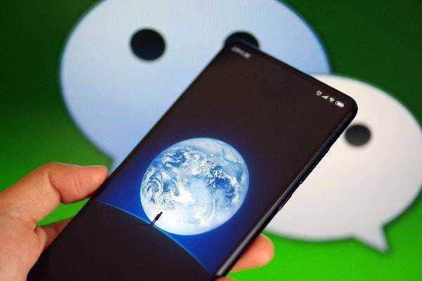 ios微信朋友圈如何虚拟定位？